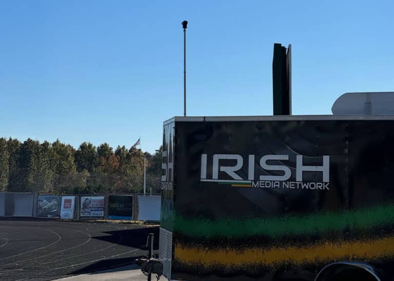 Irish Media Network trailer at Knoxville Catholic High School in front of the RATT system for enhanced sports broadcasts and security.