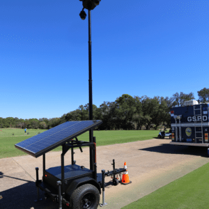 CTS FXT-44 solar surveillance trailer with outriggers deployed and mast raised at Gulf Shores Police special event