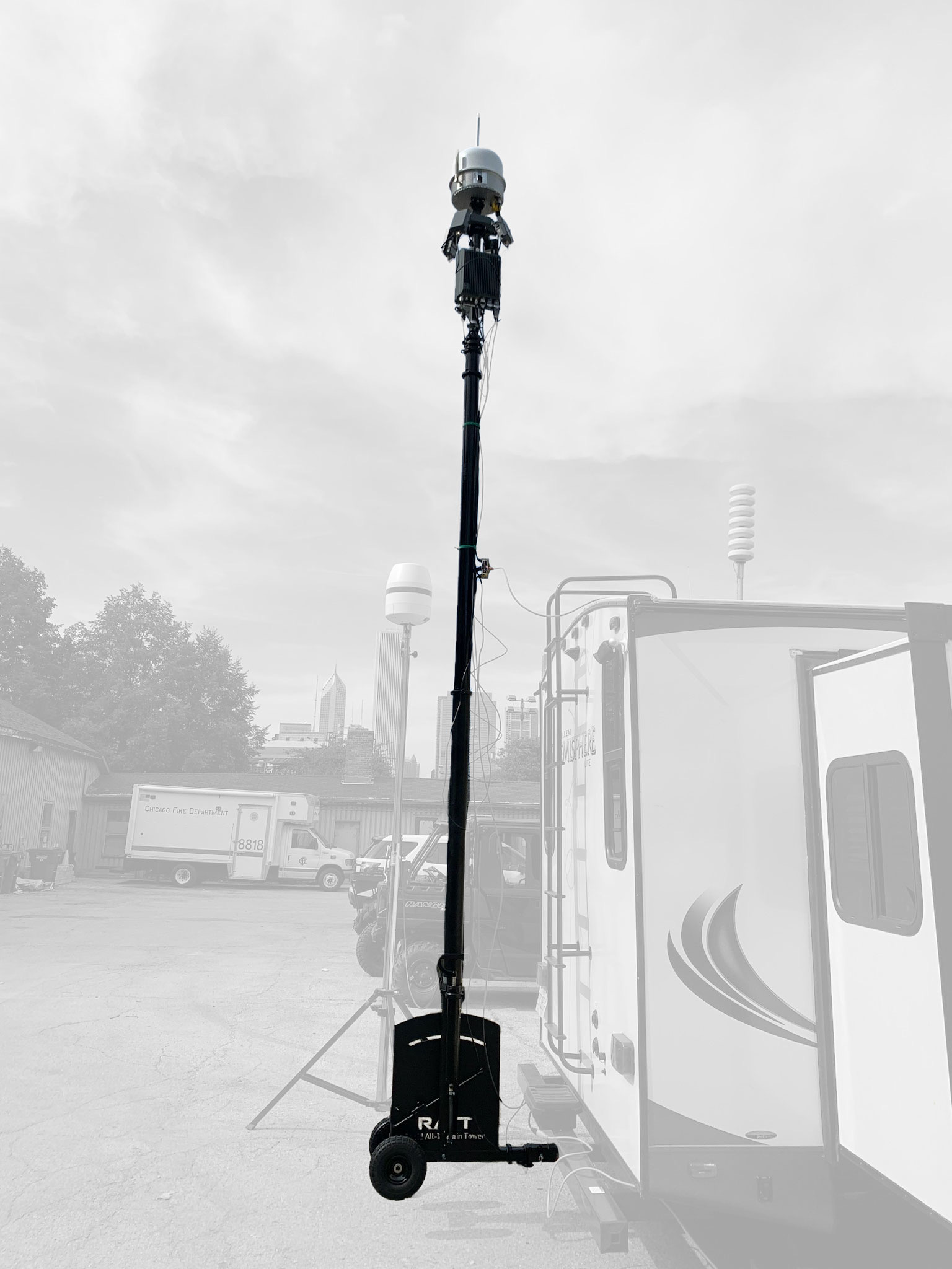 illinois-state-police-ratt-counter-drone-tower-lollapalooza-chicago.jpg - Critical Tech Solutions Hitch-mounted RATT tower deployed by Illinois State Police at Lollapalooza in Chicago with counter-drone equipment mounted on top