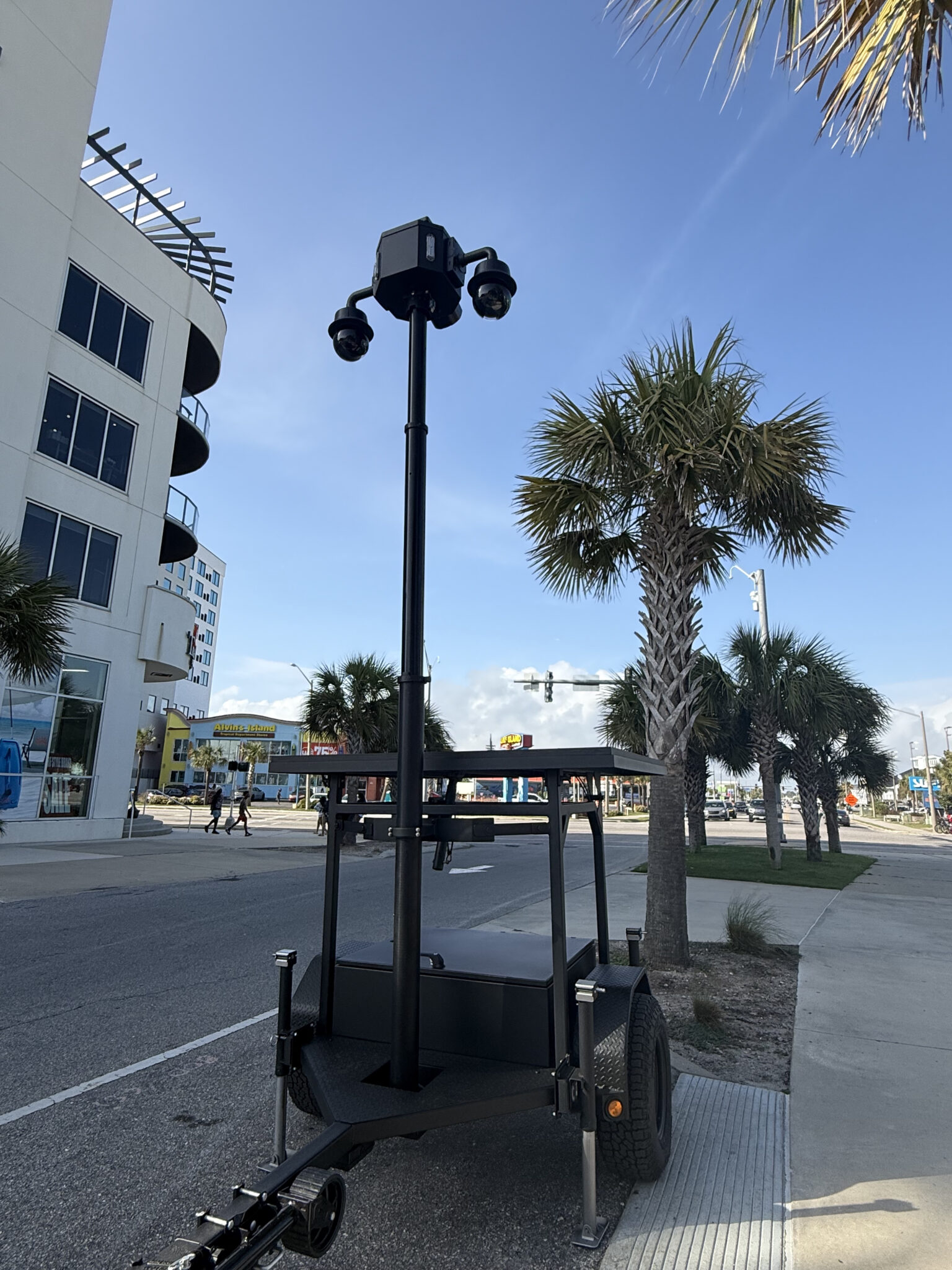 Gulf Shores Police Department FXT-44 solar surveillance trailer deployed on street during spring break 2026 streaming AV1 video over bonded cellular
