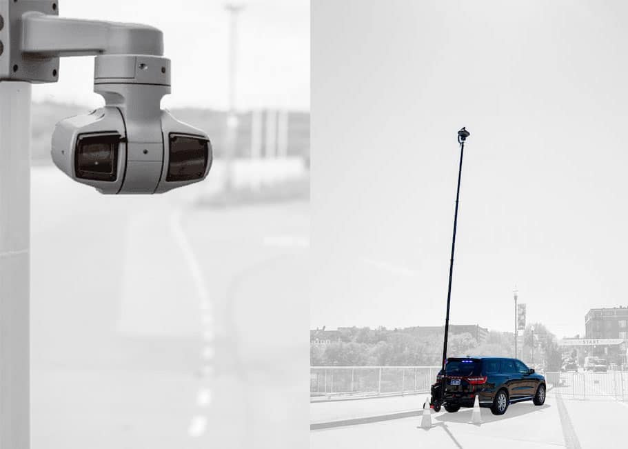 Mobile Surveillance vs Fixed Security Camera System - Tech Deployments Made Simple by Critical Tech Solutions Fixed security camera mounted on a pole beside a mobile surveillance tower with a telescopic mast and camera system.