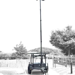 CTS FST-44 surveillance trailer deployed at University of Tennessee Knoxville near Neyland Stadium before the Luke Combs concert, featuring a 20-foot RATT mast with Axis PTZ and multisensor cameras.