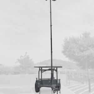 CTS FST-44 surveillance trailer deployed at University of Tennessee Knoxville near Neyland Stadium before the Luke Combs concert, featuring a 20-foot field-swappable RATT mast with Axis PTZ and multisensor cameras.